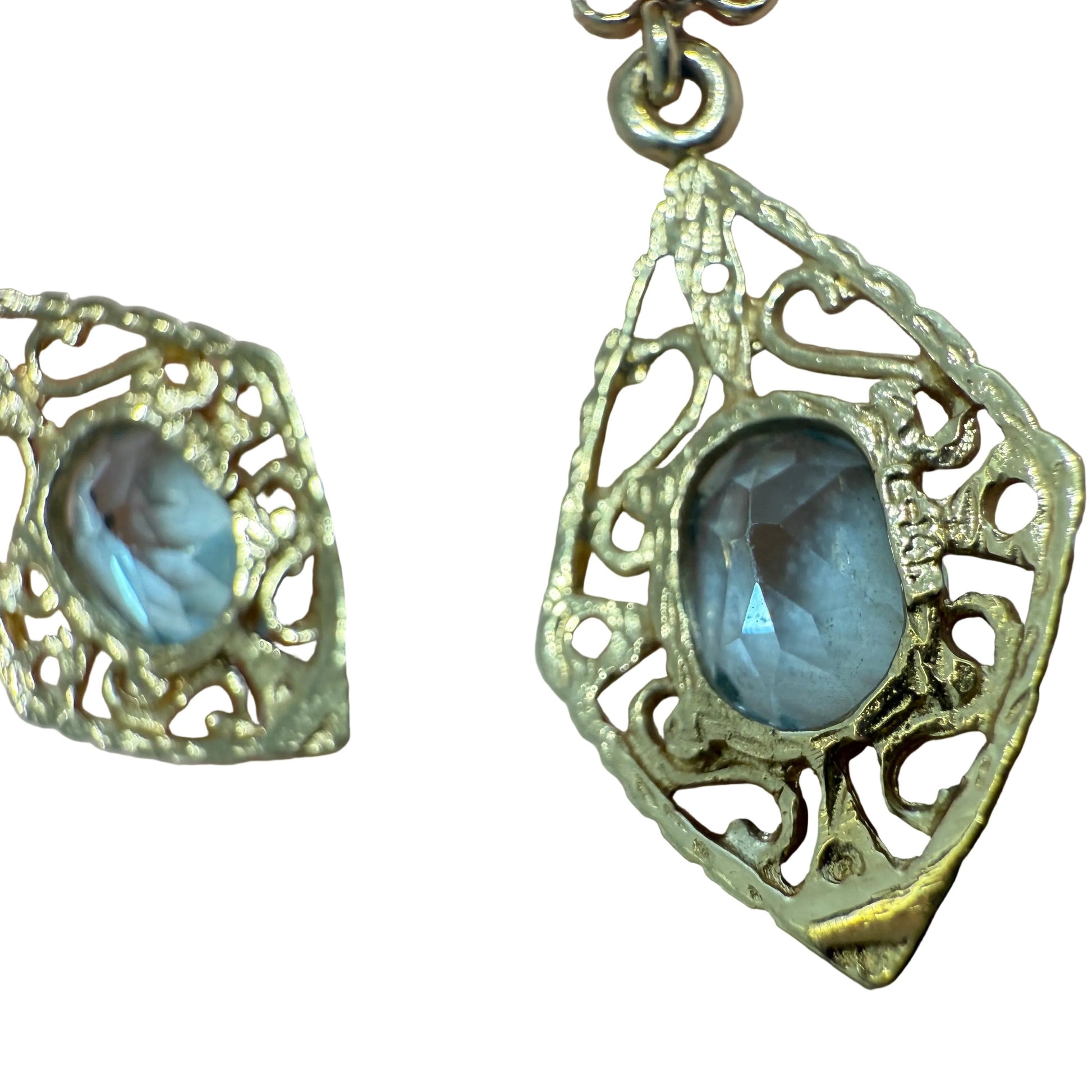 Close-up of the 14K gold stamp on the back of a vintage filigree aquamarine earring