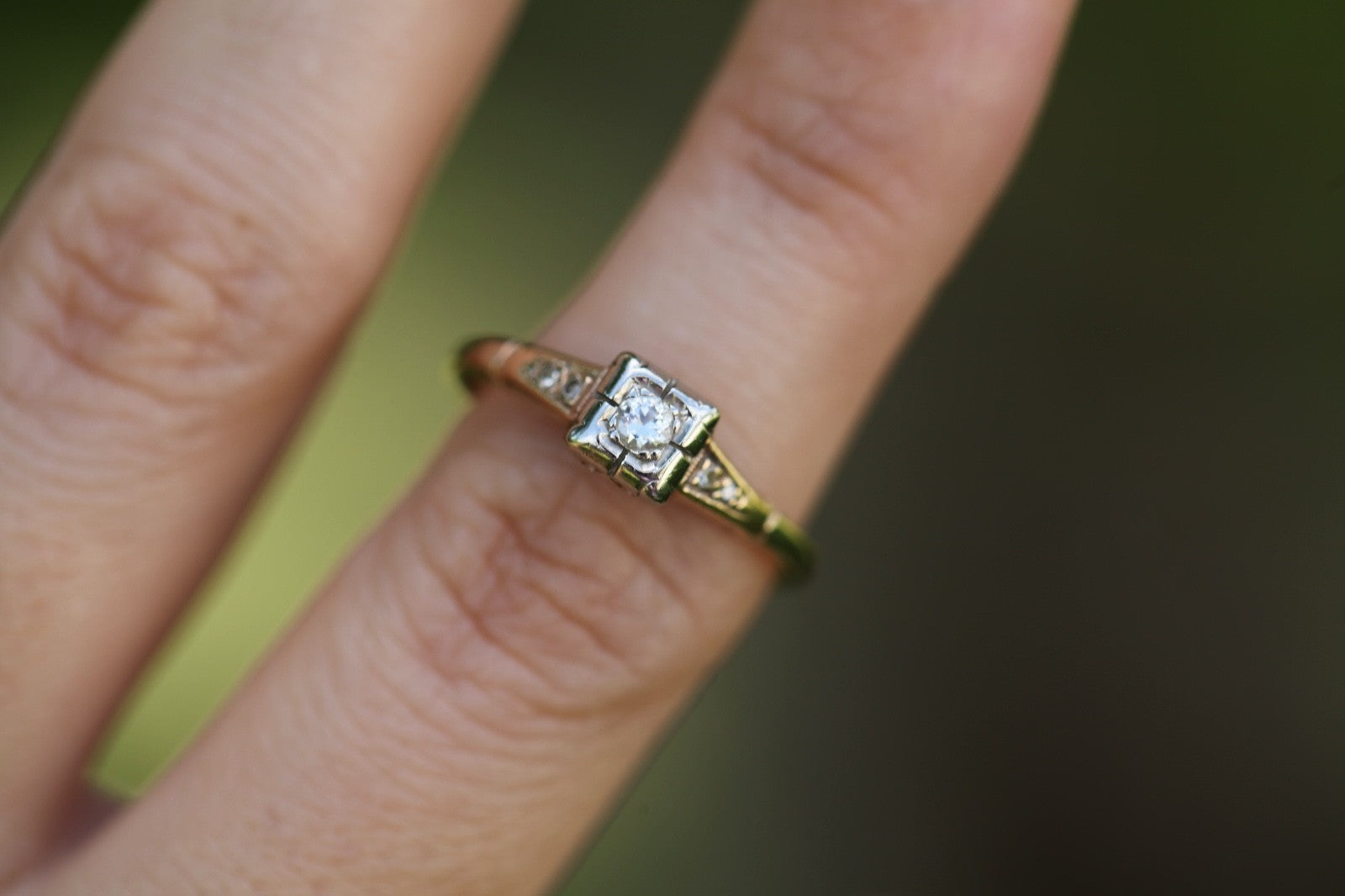 Close-up of vintage 1930s Art Deco ArtCarved 14K two-tone diamond ring with old European cut illusion head