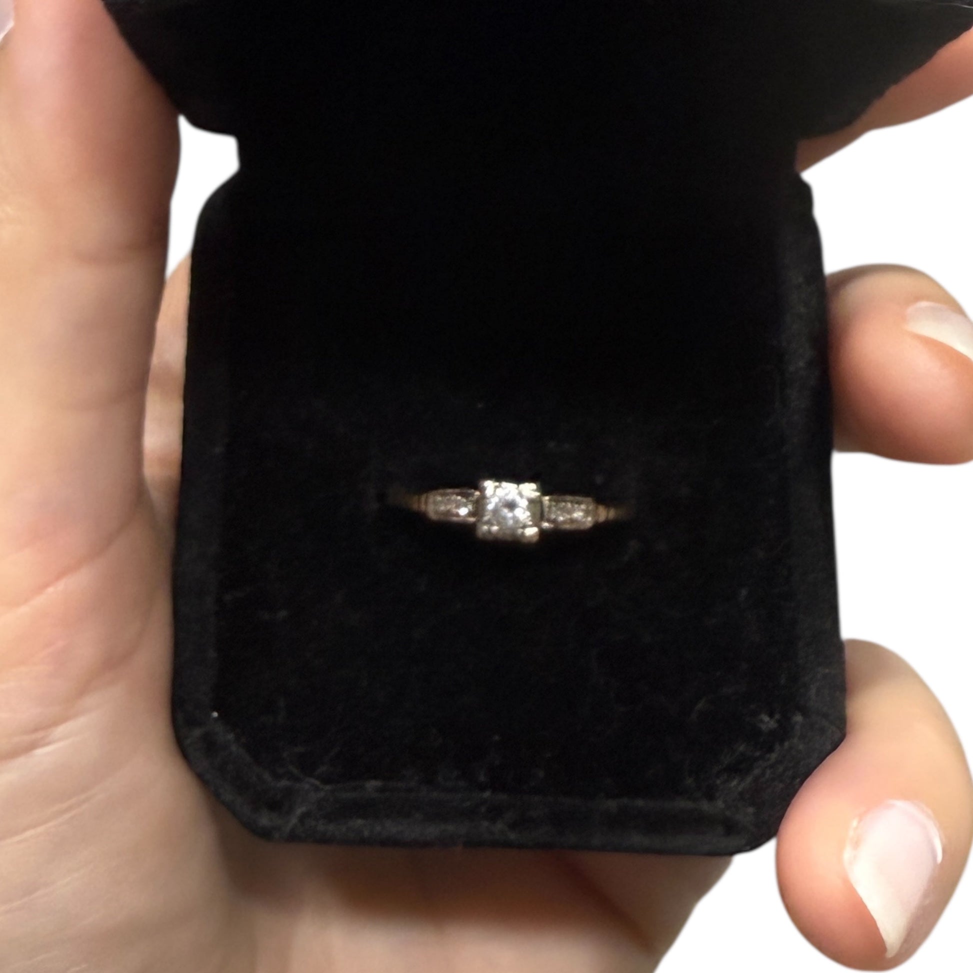 1940s vintage 14K two-tone diamond engagement ring displayed in black velvet ring box