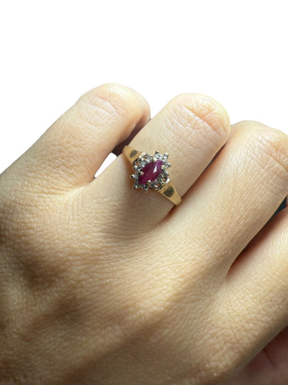 1970s vintage 10K gold ruby and diamond halo ring, marquise cut, size 5.75, shown worn on hand