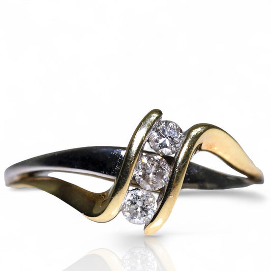1970s vintage 10K two tone gold diamond bypass ring with three round diamonds