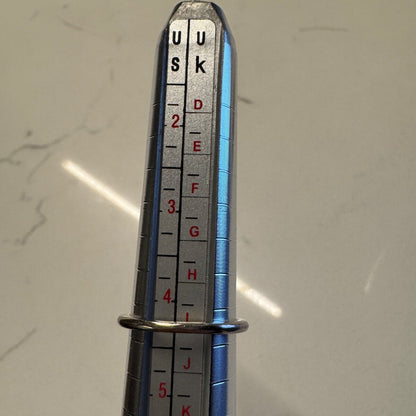 Ring shown on a US ring mandrel indicating approximately size 4.25