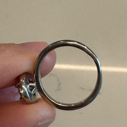 Rear view of the 18K white gold diamond ring band showing smooth circular shank
